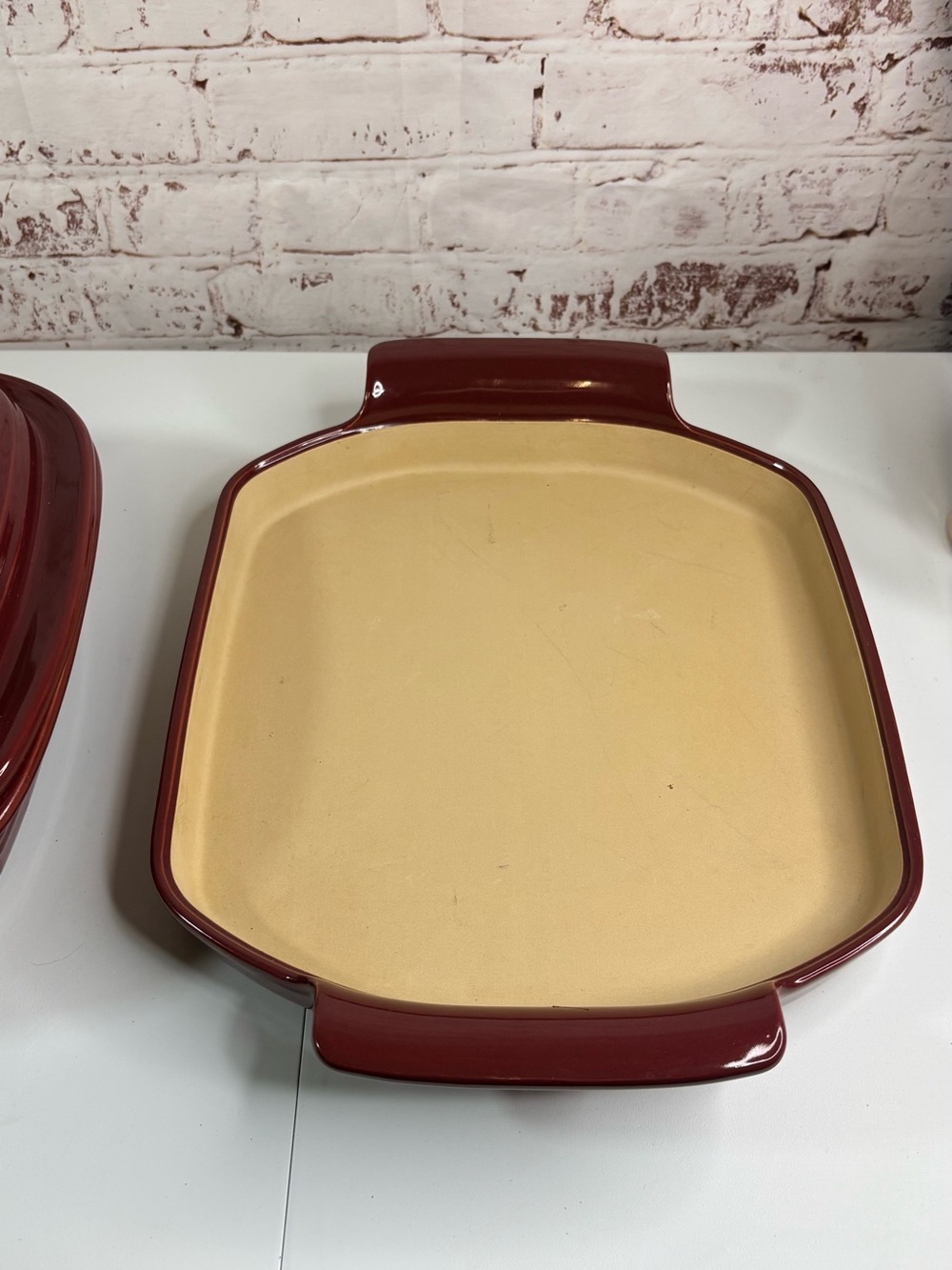 The Pampered Chef Deep Square Baking Dish in Burgundy with Cream Interior